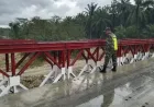 Babinsa Kodim 0103/Aut Perkuat Patroli Infrastruktur Pasca Banjir di Aceh Utara