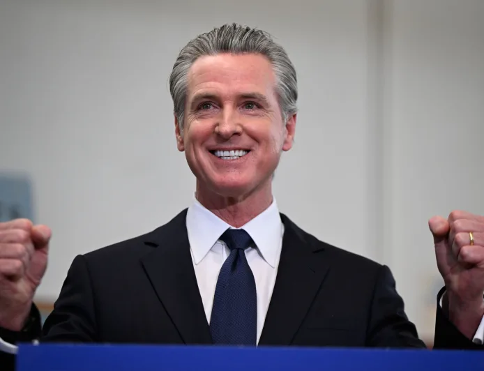 Newsom touts OpenAI, Anthropic as AI boom bails out California budget