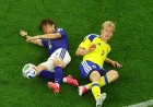 Jepang Tahan Swedia 1-1, Samurai Biru Lolos Grup F Dampingi Belanda